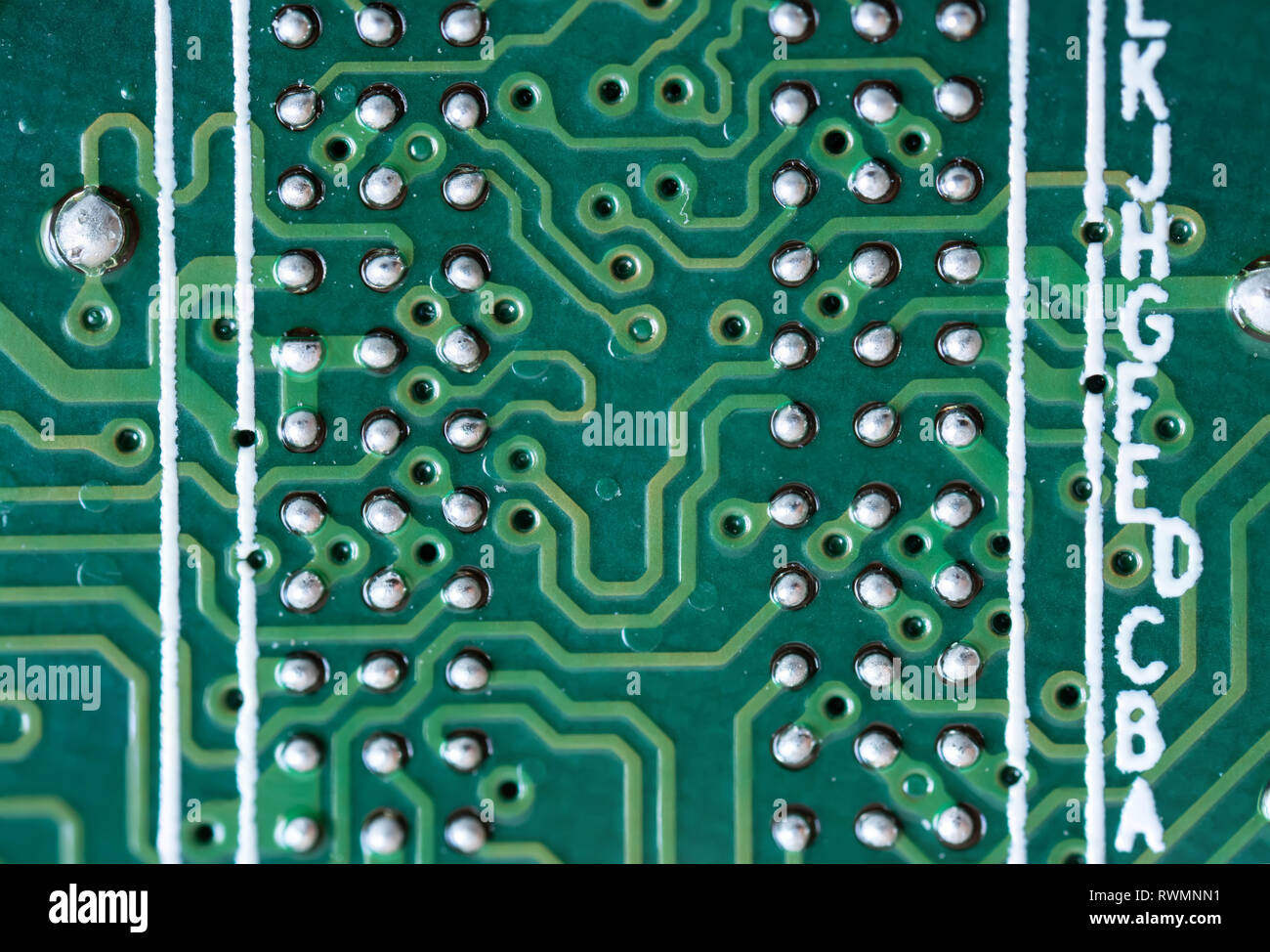 Printed circuit board close-up, contact tracks of electronics Stock Photo