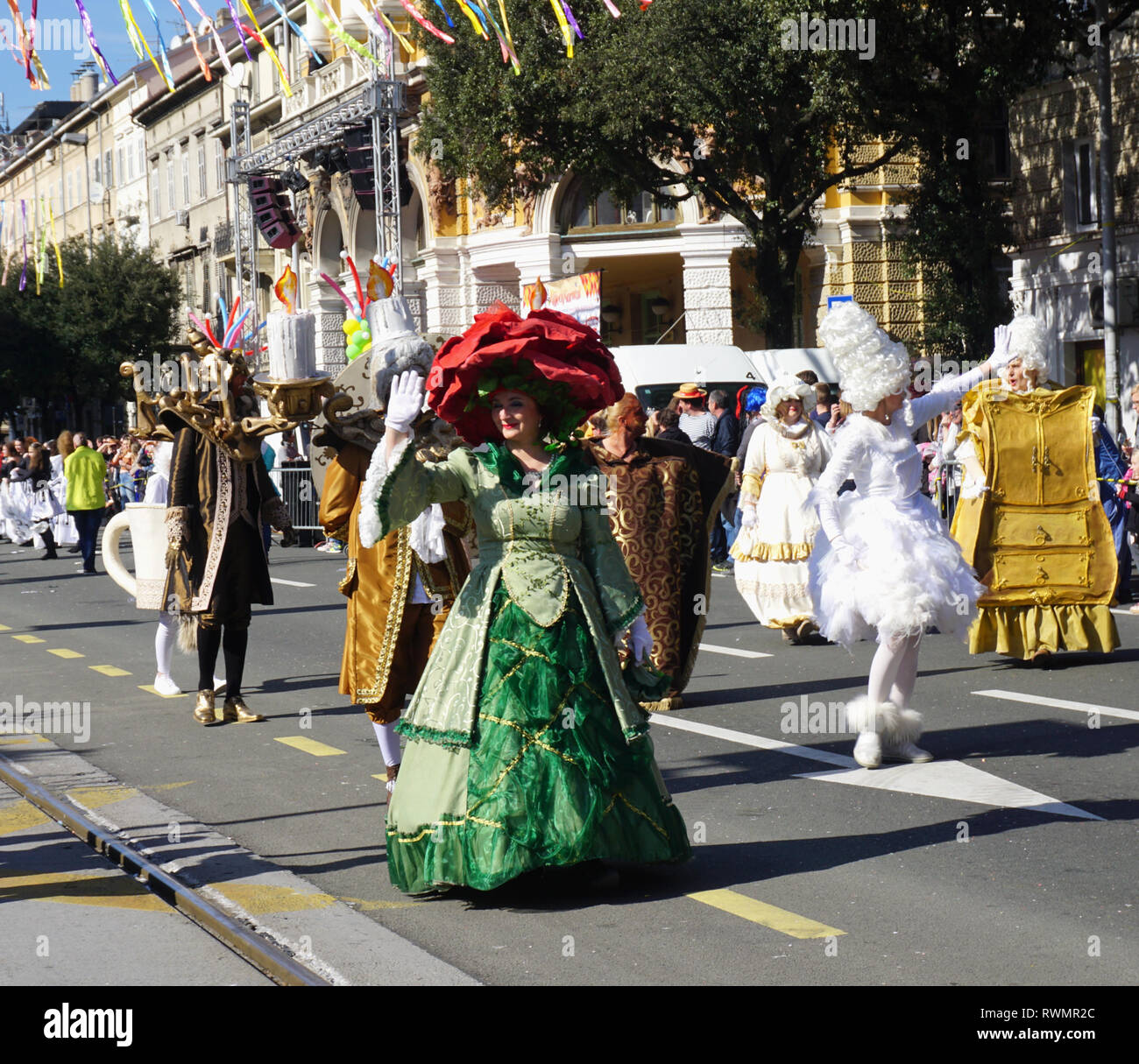 Rijeka, Croatia, March 3rd, 2019. Carnival group of masked people in the  costume from Beauty and the beast film Stock Photo - Alamy