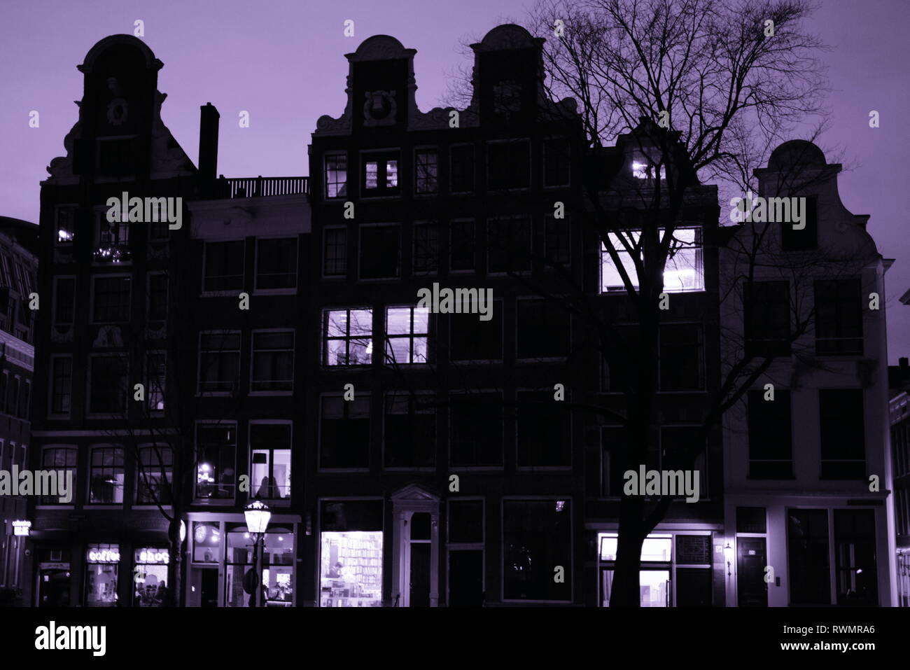 amsterdam - houses on the kloveniersburgwal canal.early evening shot.2019 Stock Photo