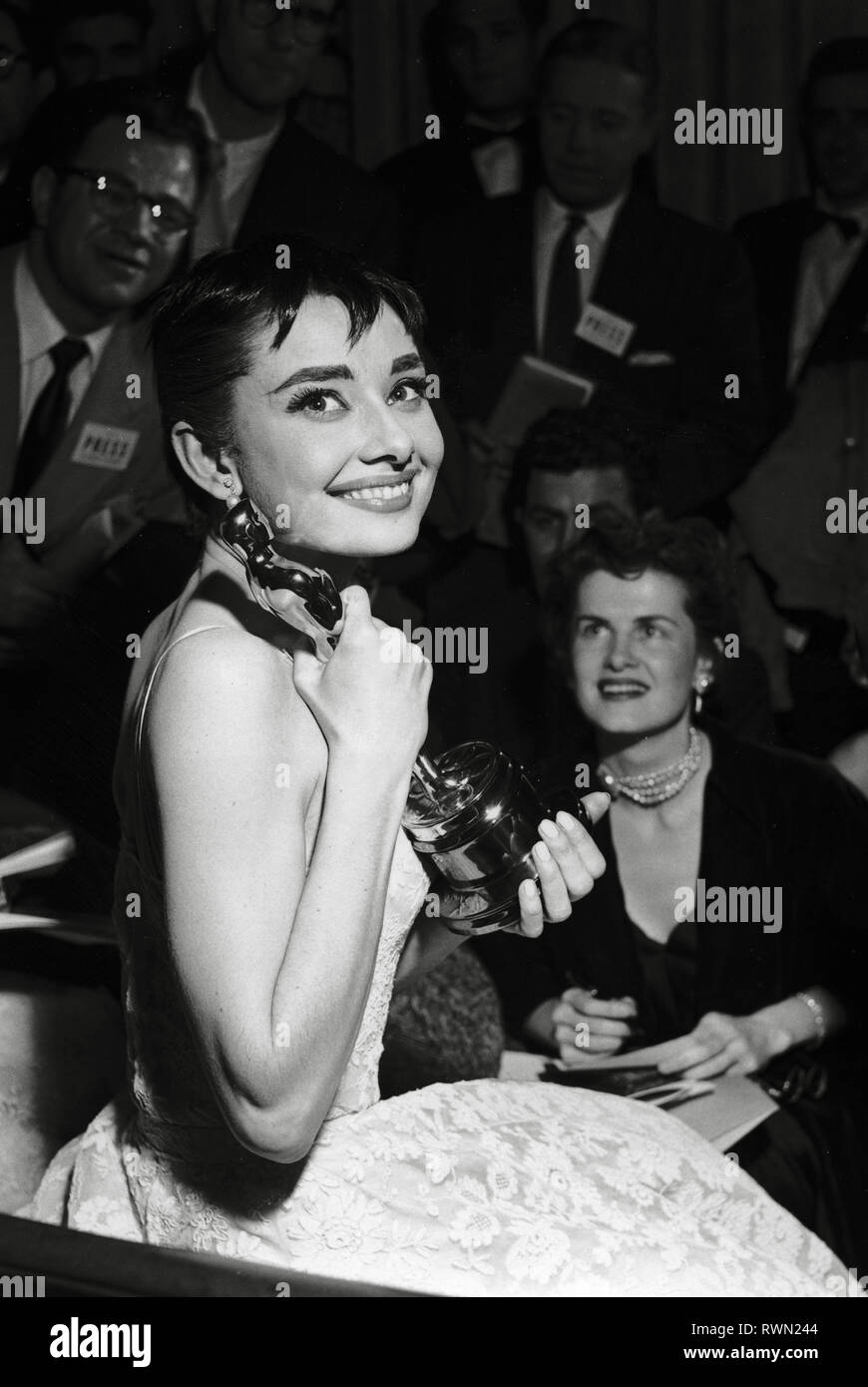 Audrey Hepburn wearing a white floral dress by Hubert de Givenchy at the 26th Annual Academy Awards held at the NBC Century Theatre in New York City on March 25, 1954. Hepburn won best actress for 'Roman Holiday'  File Reference # 33751 478THA Stock Photo