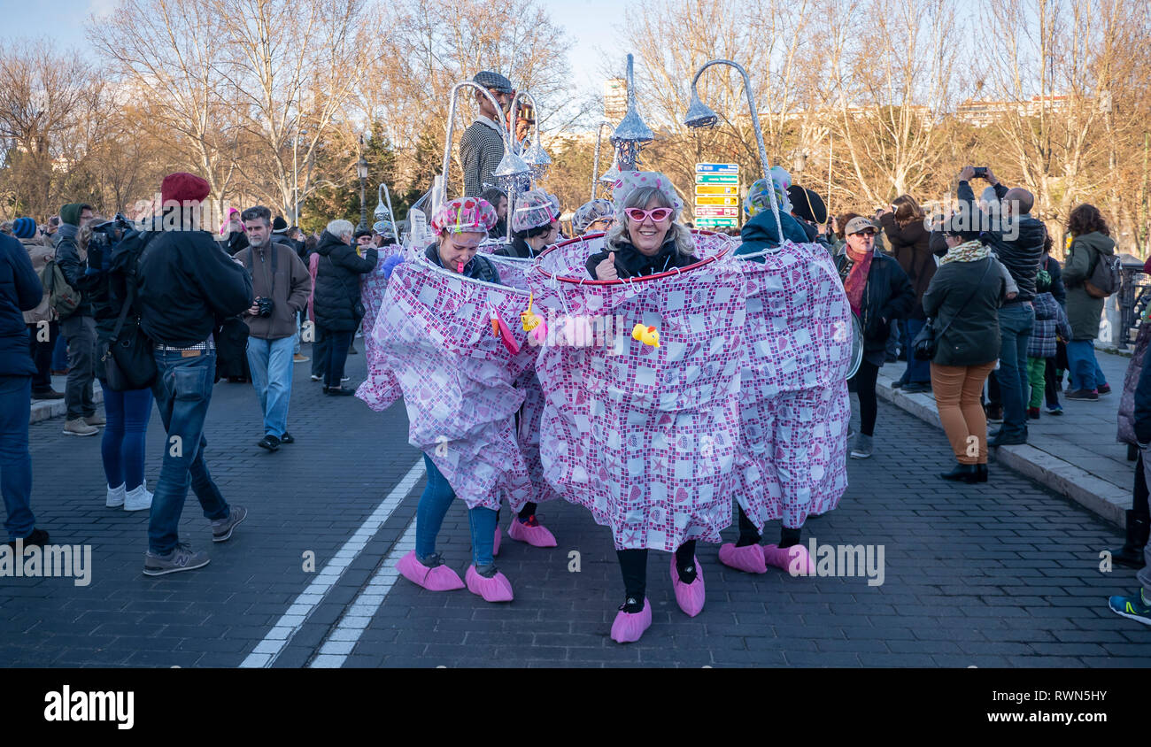 Women seen dressed like showers seen during the event. The traditional “Burial of the Sardine” is a ceremony that takes place in Madrid to mark the end of Carnival celebrations and beginning of 40 days Lent before Easter. It consists of a parade that parodies a funeral in which a symbolic figure in the shape of a sardine is burned. This festivity coincides with Ash Wednesday and symbolizes the burial of the past and the rebirth of society. Stock Photo