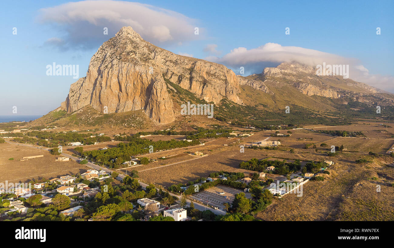 Monte Monaco near San Vito lo Capo known for hiking trail to top of rocky summit marked with a wooden cross & offering panoramic views Stock Photo