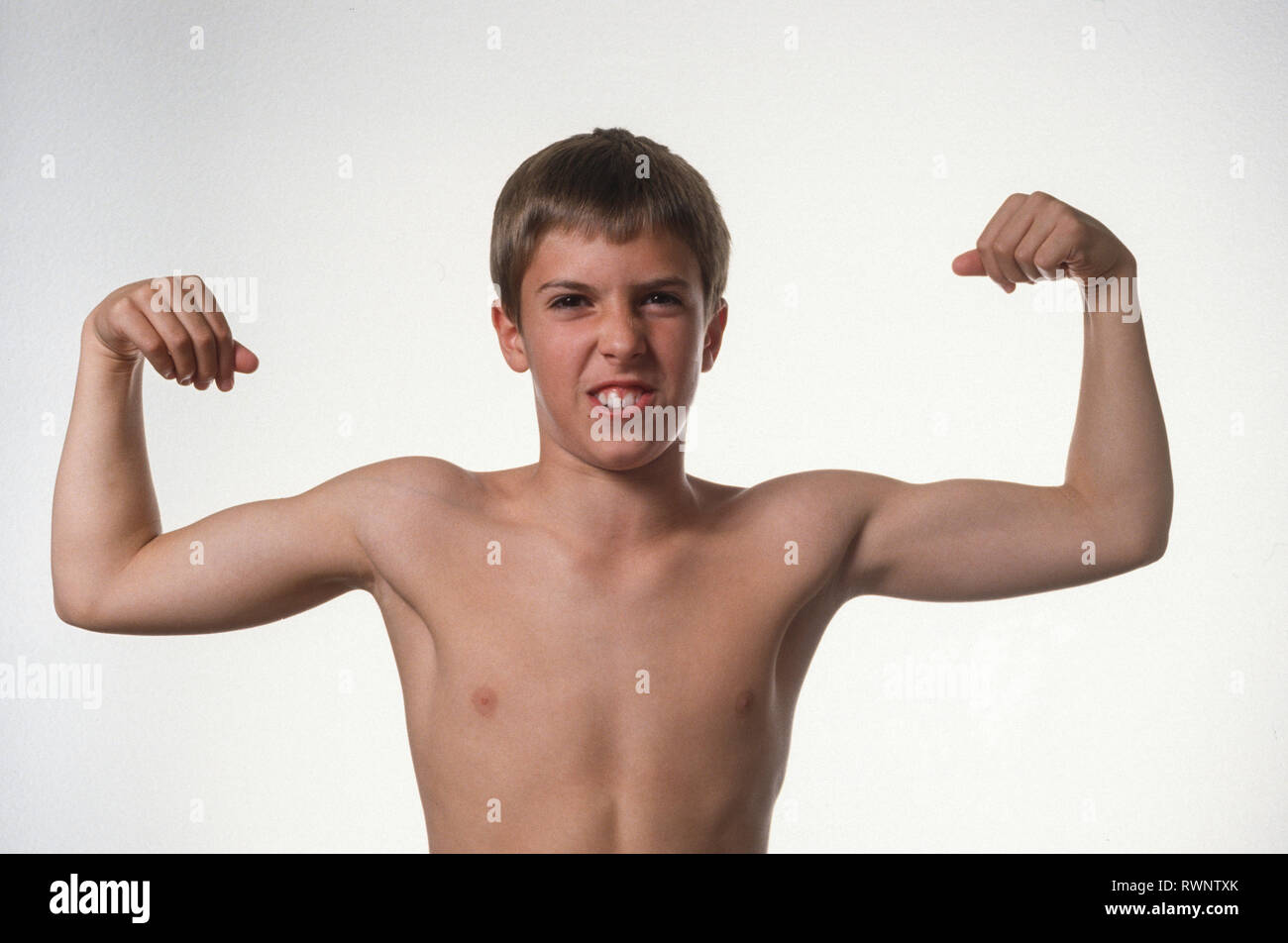 Young Boy Flexs His Muscles USA Stock Photo Alamy young-boy-flexs-his-muscles-usa-stock-photo-alamy