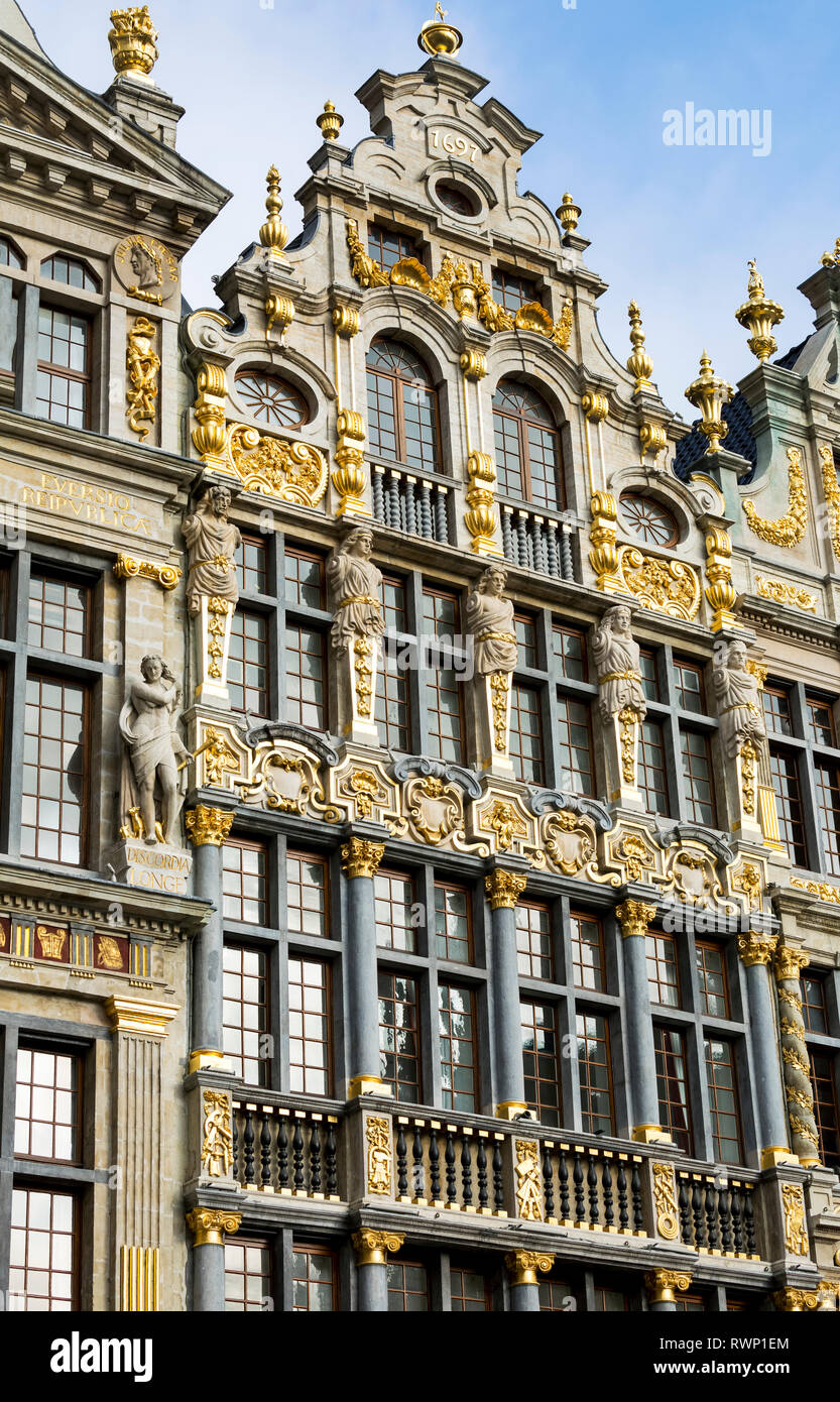 Decorative building front with gold trim and blue sky; Brussels, Belgium Stock Photo