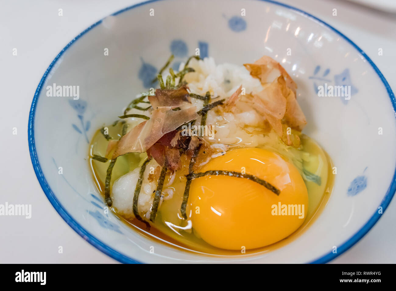 Close up shot of traditional Japanese style breakfast (Dry fish with raw egg rice), ate at Hokkaido, Japan Stock Photo