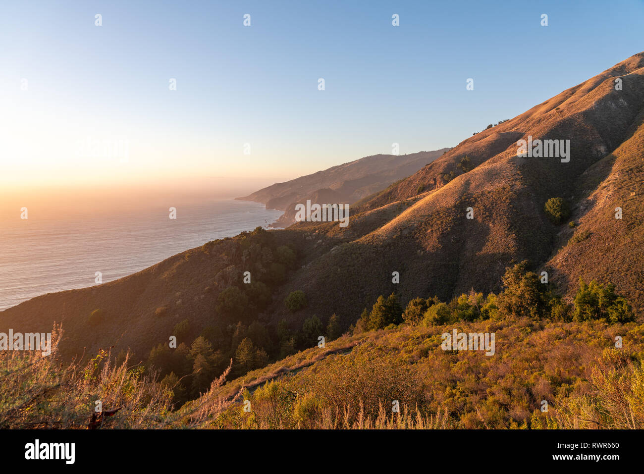 Big Sur, California - Scenic overlook off sunset on the hills along the Pacific Coast. Stock Photo