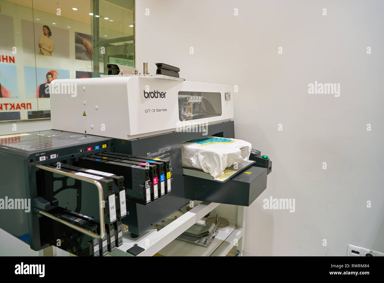 MOSCOW, RUSSIA - CIRCA SEPTEMBER, 2018: Brother GT-3 Series printer white T-shirt  printing at Uniqlo store in Moscow. Uniqlo Co. Ltd is a Japanese cas Stock  Photo - Alamy