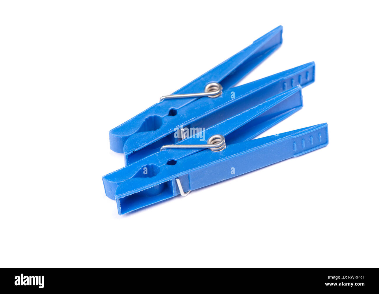 Blue plastic clothespins isolated on white background Stock Photo Alamy