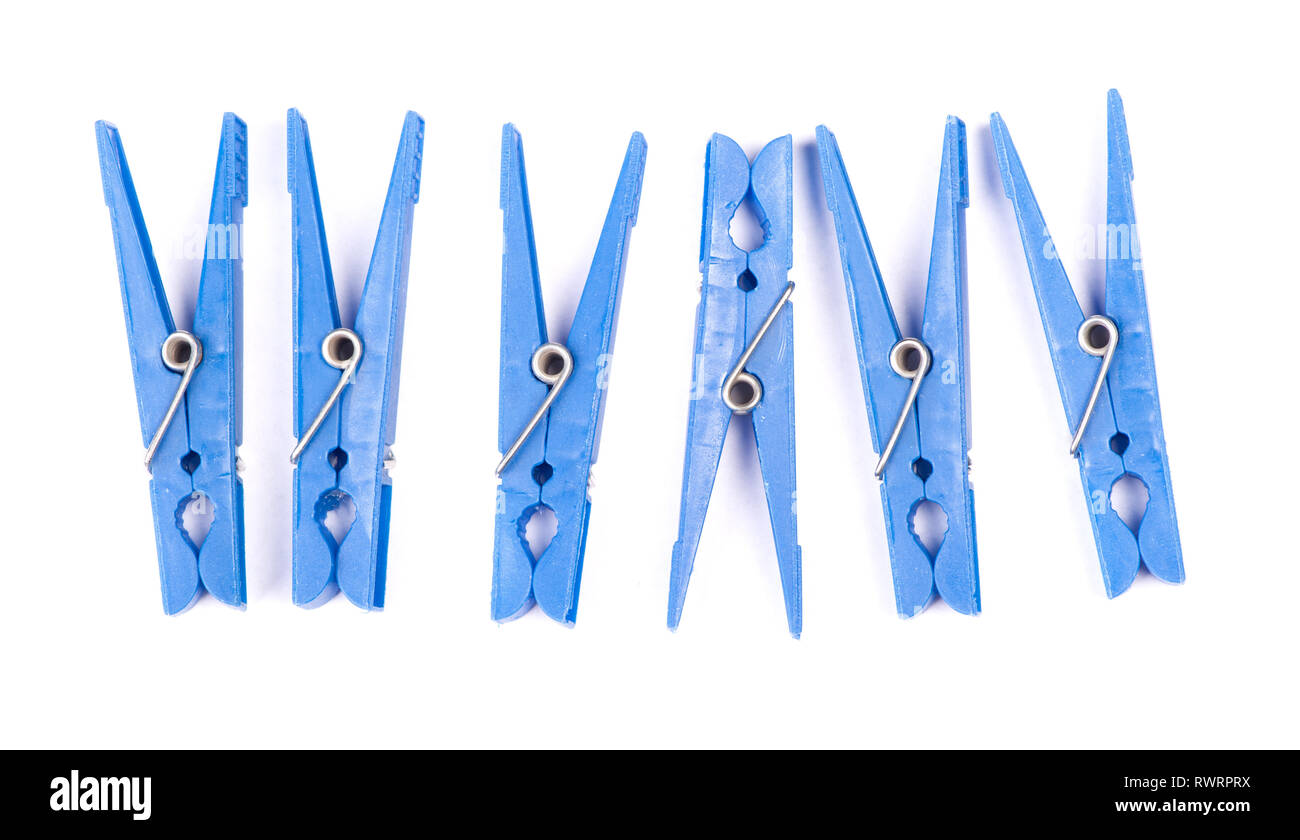 Blue plastic clothespins isolated on white background Stock Photo Alamy