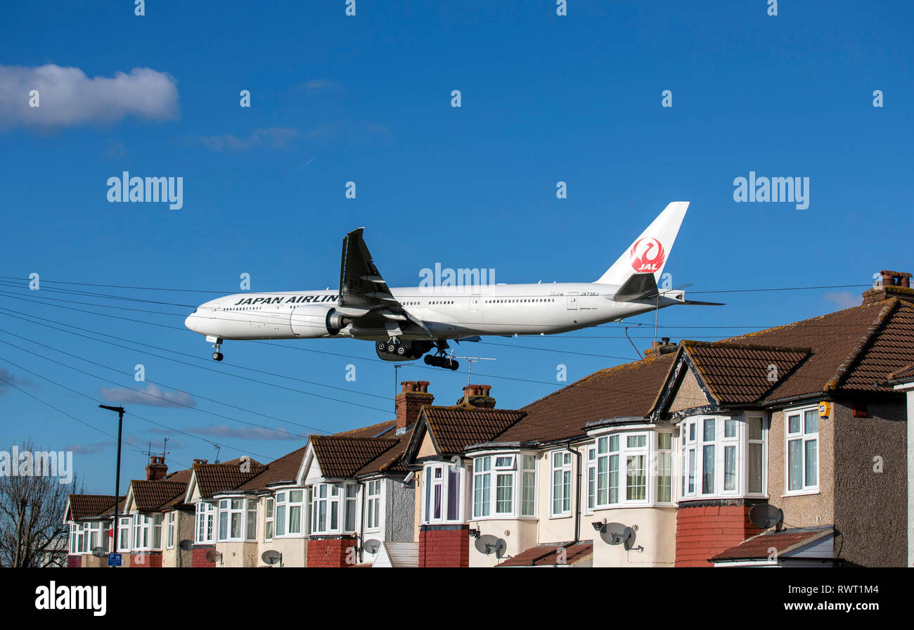 A japan airlines boeing 777 plane lands heathrow airport hires stock