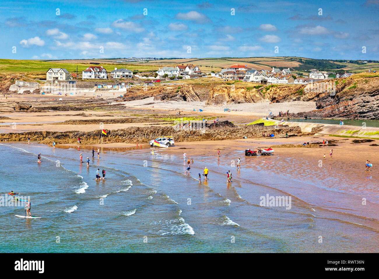 6 July 2018: Bude, Cornwall, UK - Crowds enjoying sun,sea and sand during the summer heatwave. Stock Photo