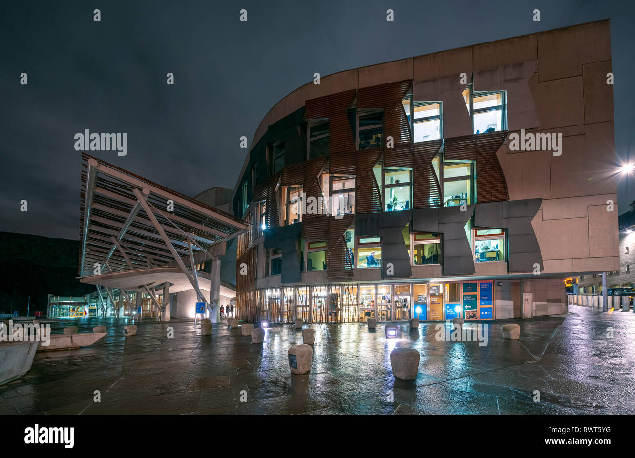 Night view of exterior of Scottish Parliament building at Holyrood in Edinburgh, Scotland, UK Stock Photo
