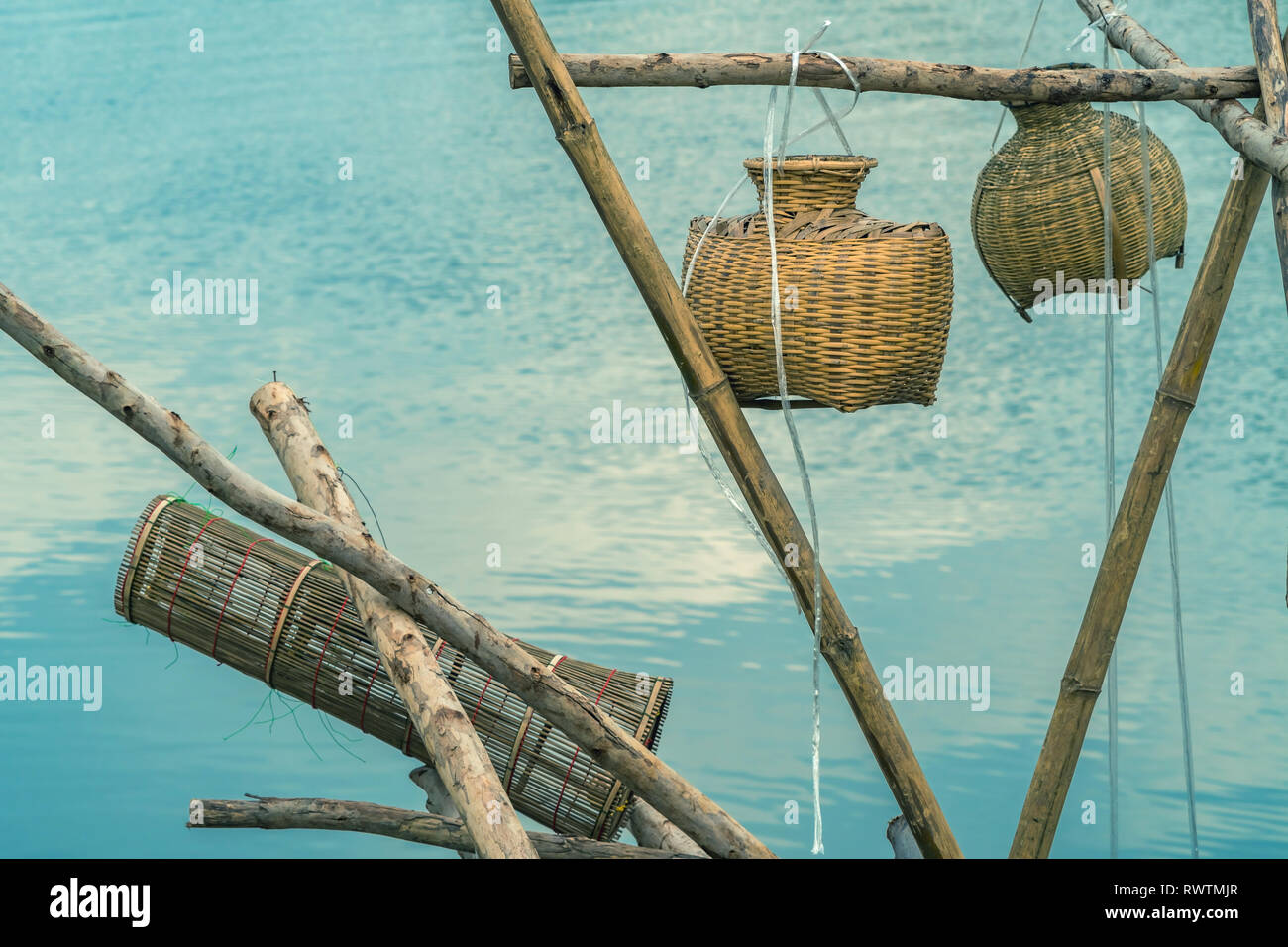 Ancient bamboo fish trap equipment of countryside, Thailand Stock Photo