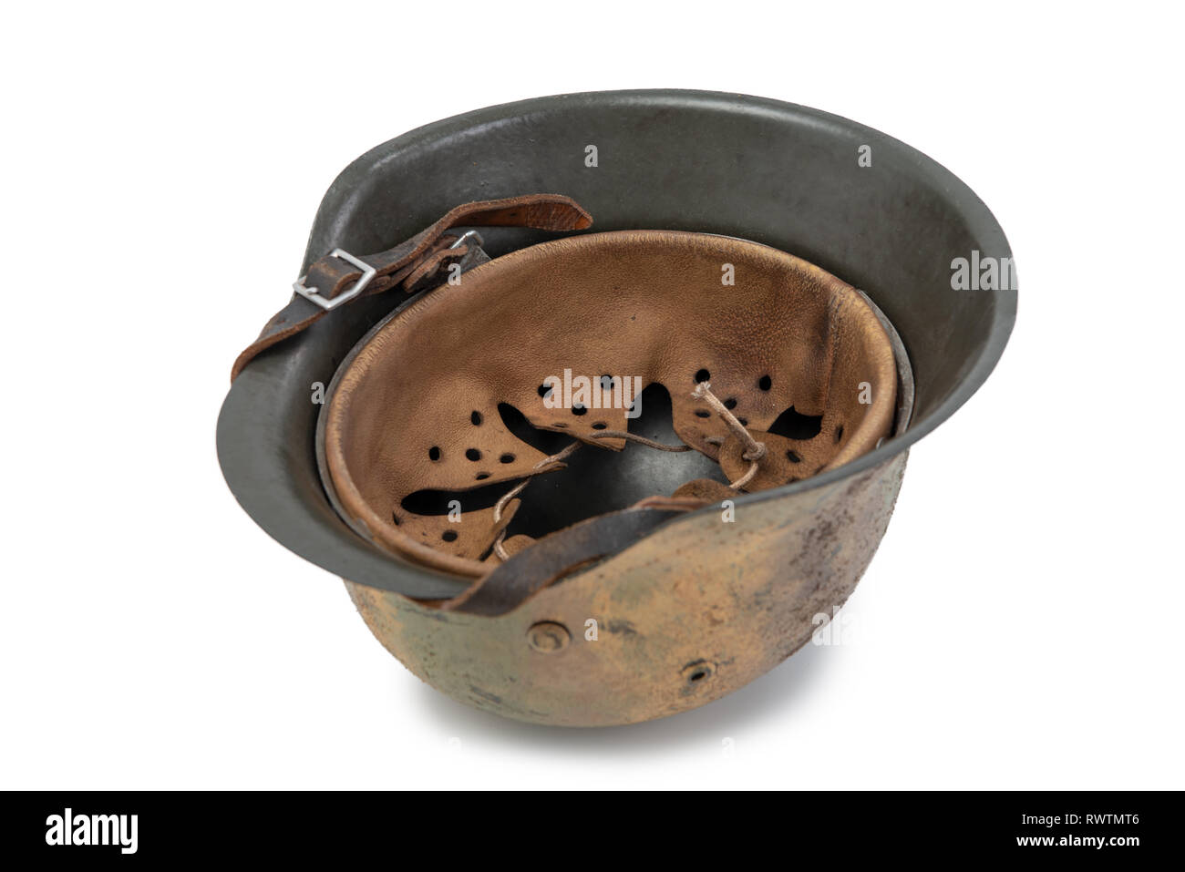 German World War Two (Stahlhelm M1942) military helmet, battle of  Normandy 1944 Stock Photo