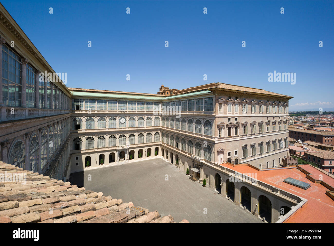 Rome. Italy. Cortile di San Damaso with loggias (left, architect Donato Bramante, 1444-1514, built 1512–18) and the Apostolic Palace (right, architect Stock Photo