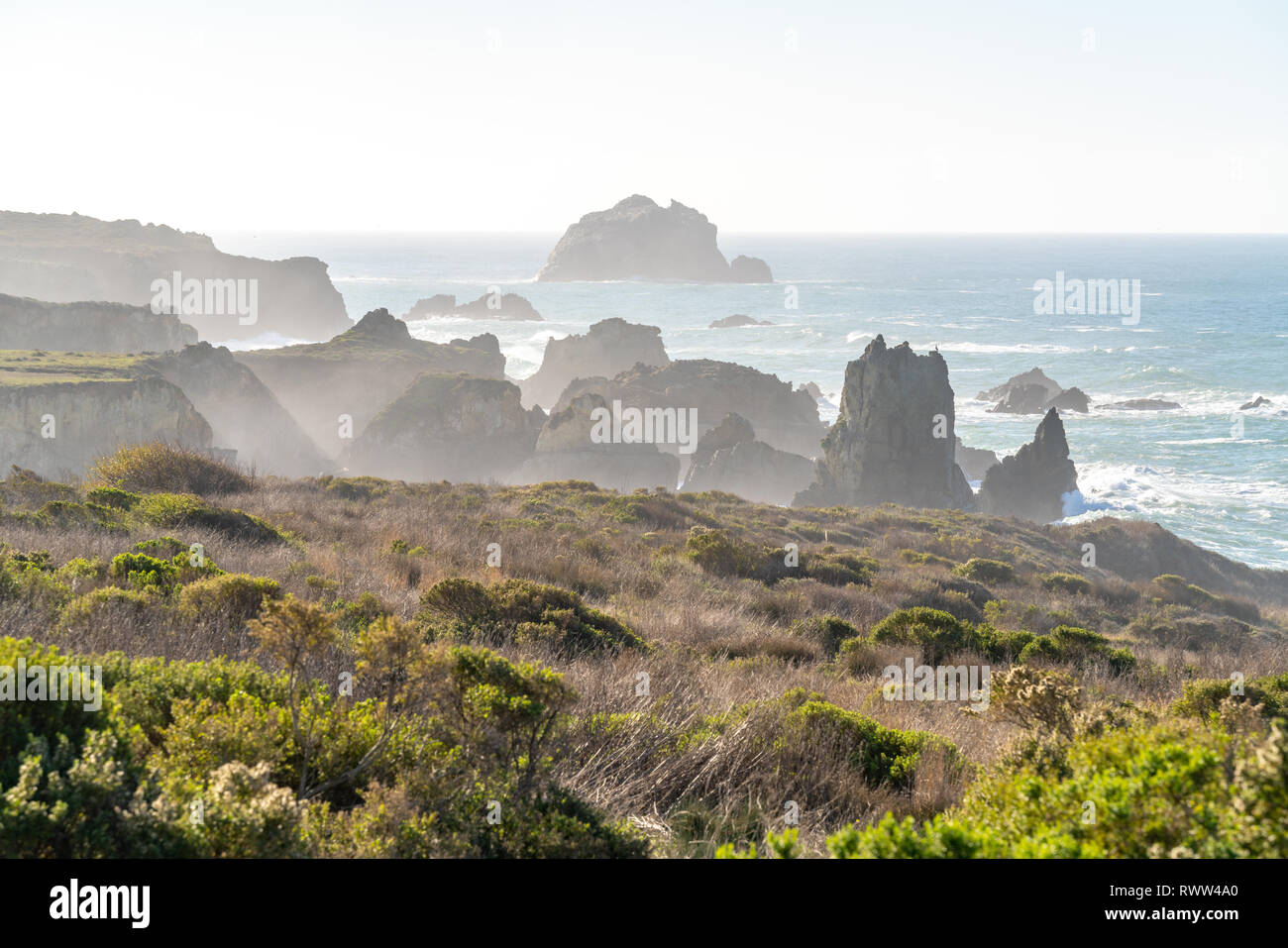 Big Sur, California - Many layers of sea stacks and rugged coastline along the west coast of the United States and the famous Highway One. Stock Photo