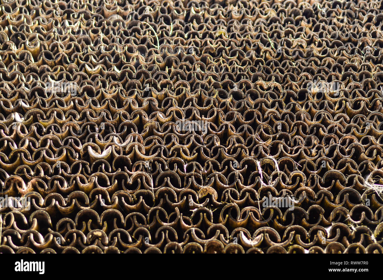 Beautiful pattern on the roof of a Tongkonan house in Toraja. The roof are made of bamboo pilled up carefully. Stock Photo