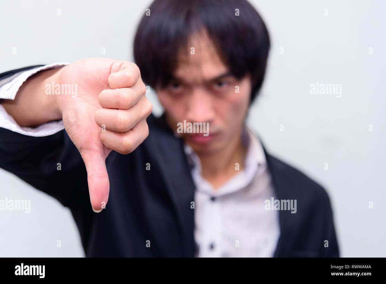 A business man thump down his hand Stock Photo