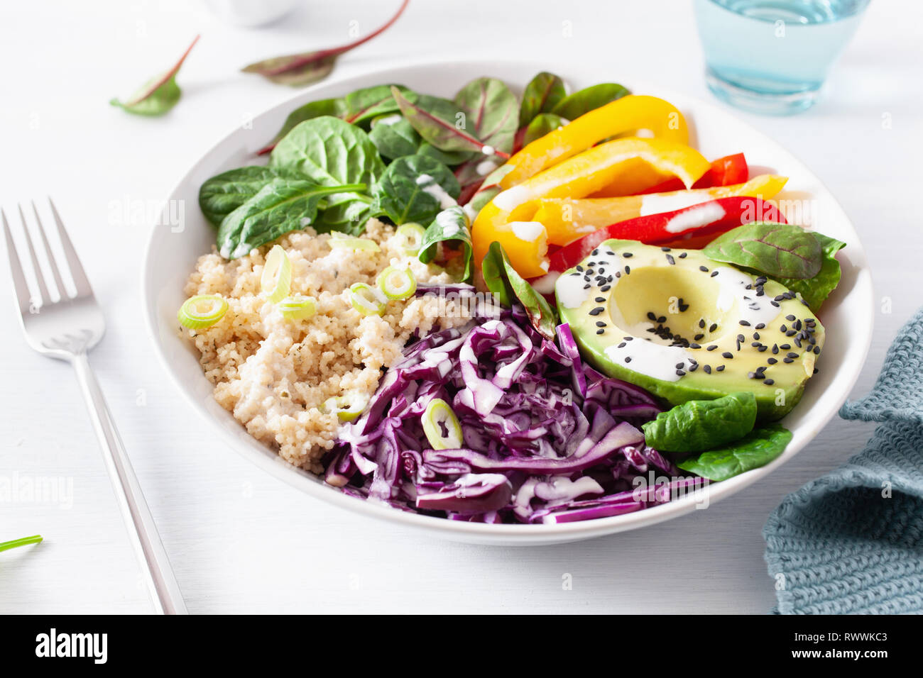 veggie couscous lunch bowl with avocado, bell peppers, spinach and red cabbage Stock Photo Alamy