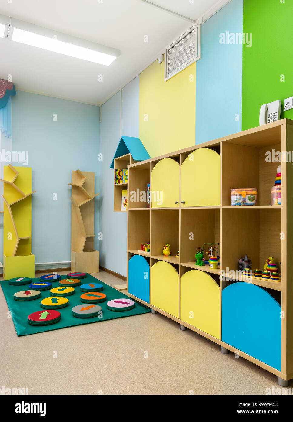 Kindergarten, toys on the shelves. Kindergarten with toy sets. Closeup
