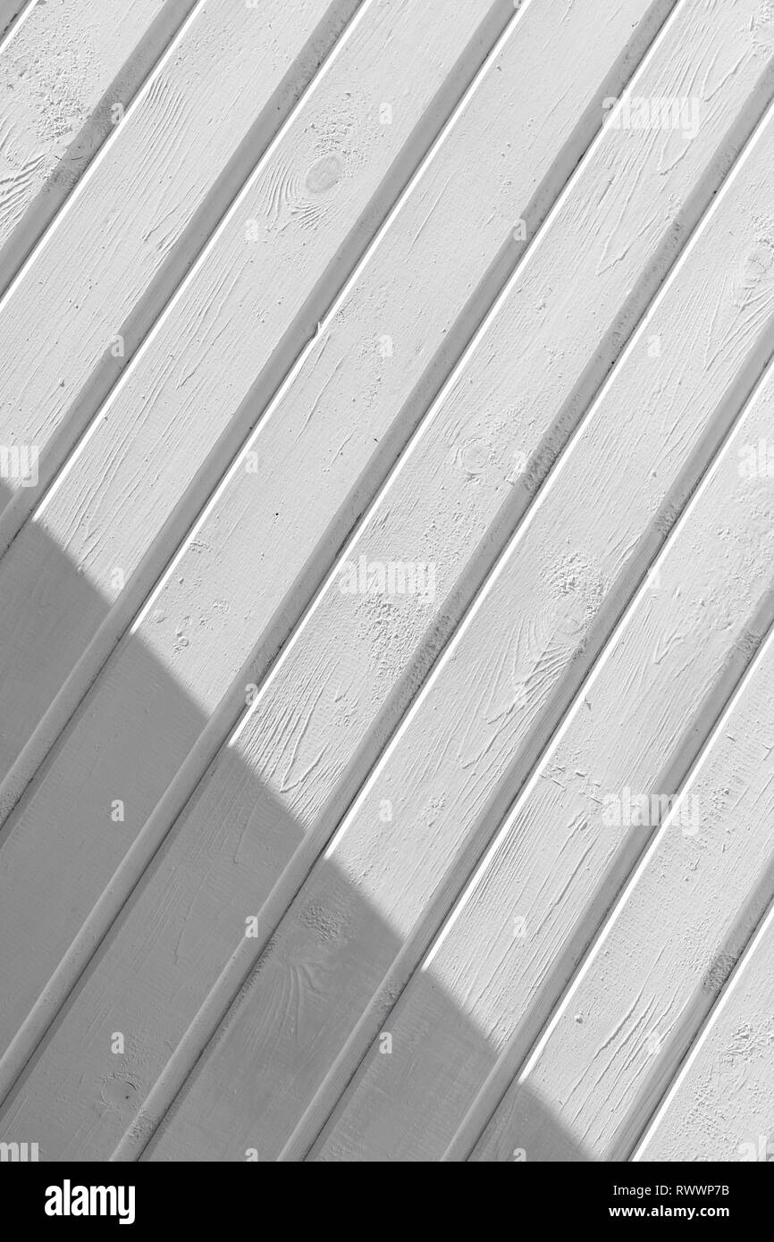 New white wooden wall with shadow area, abstract vertical background photo Stock Photo