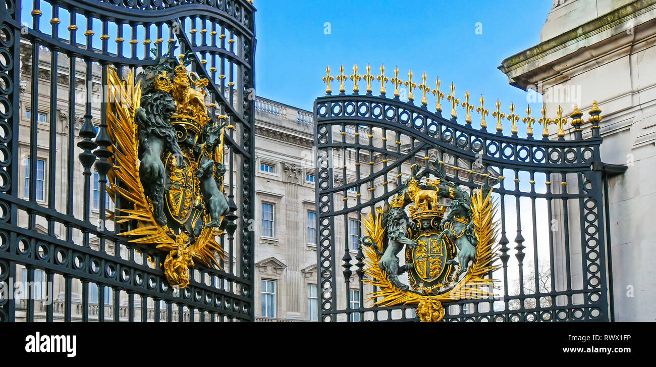 The huge gate of the Buckingham Palace is open. Palace police and guards have opened the gate for the ceremony Stock Photo