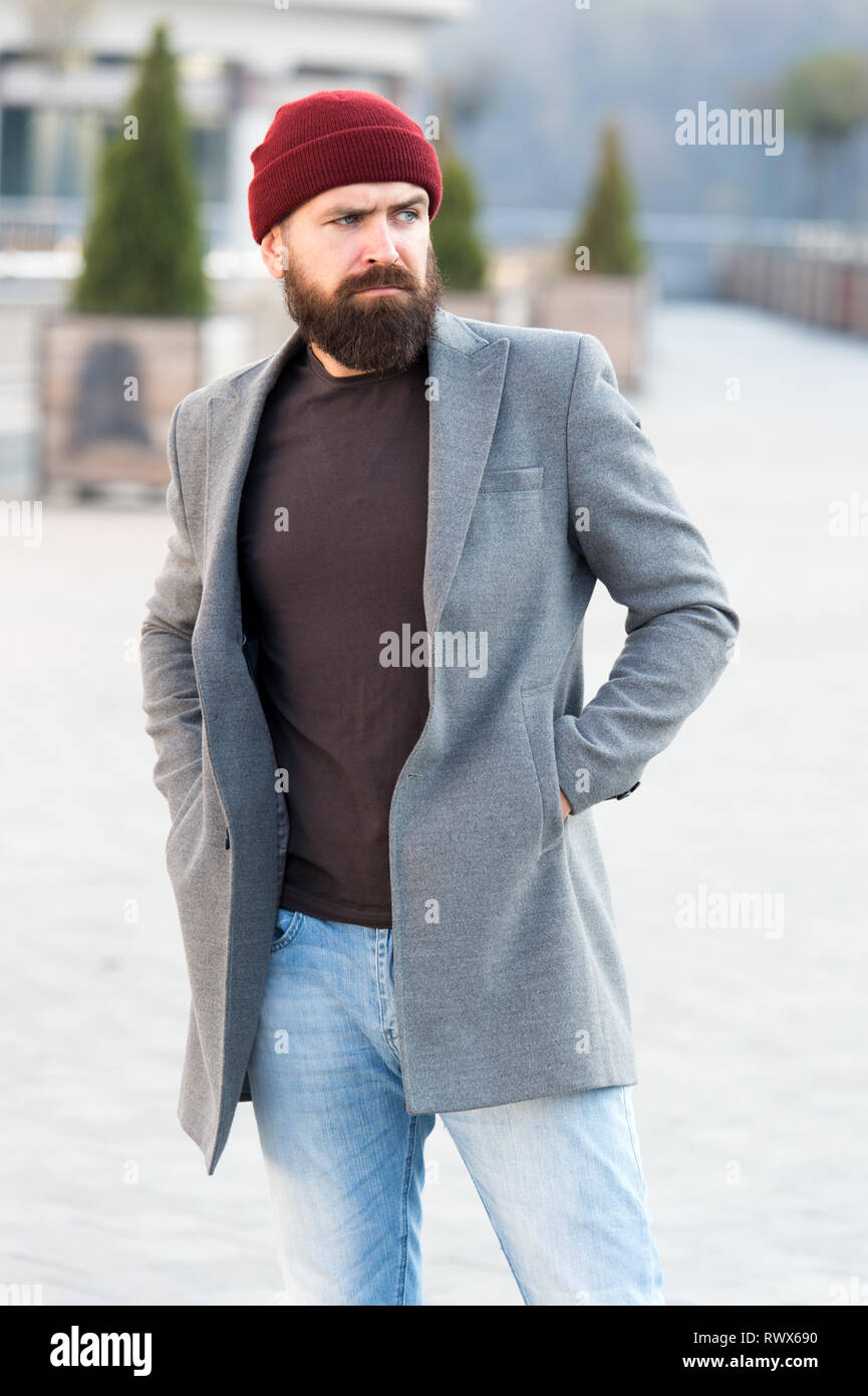 Hipster outfit and hat accessory. Casual outfit spring season. Menswear and  male fashion concept. Man bearded hipster stylish fashionable coat and hat.  Comfortable outfit. Comfortable with his style Stock Photo - Alamy