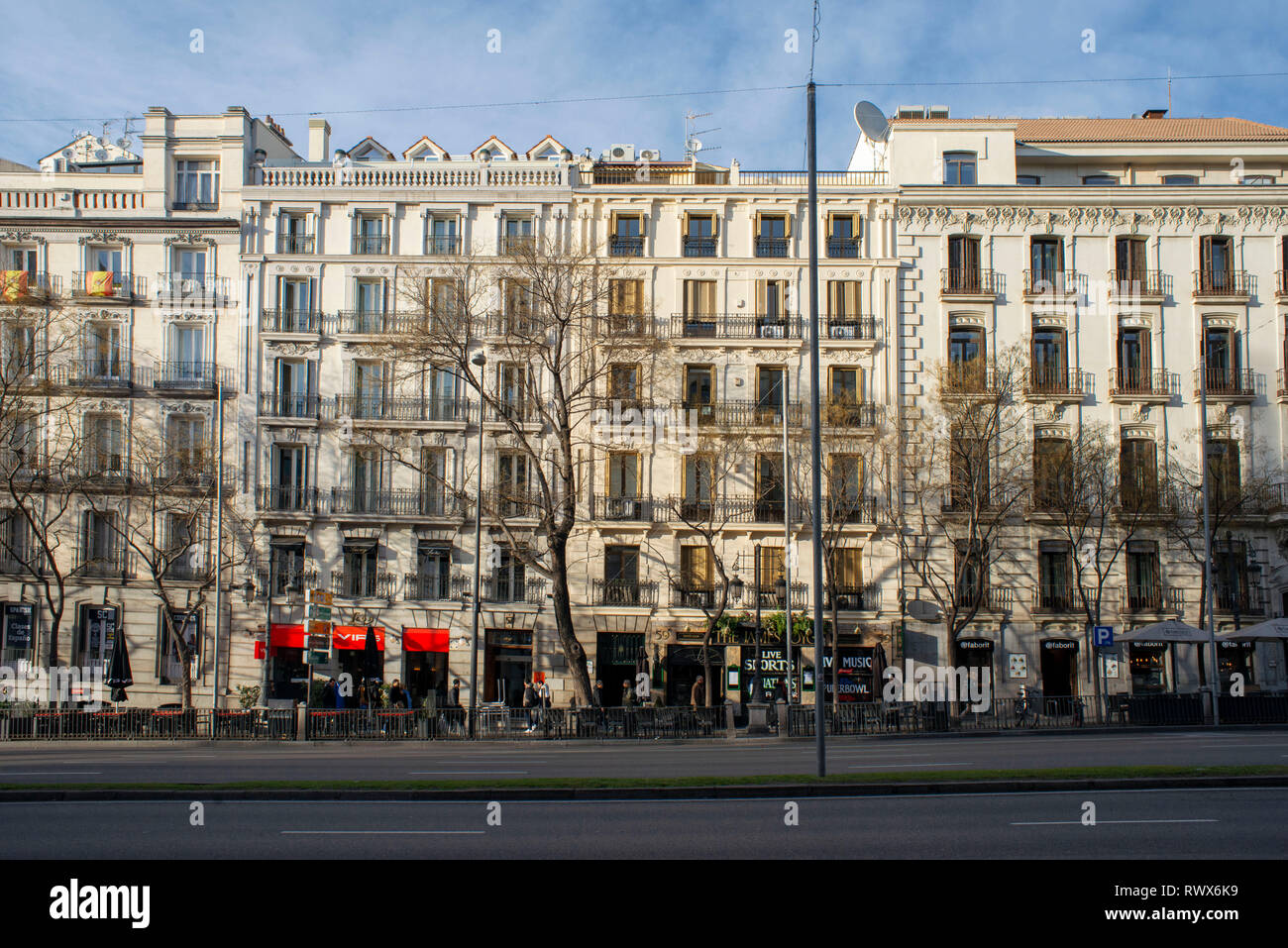 Front view of the buildings facades and apartments in Alcala street, Madrid city center, Spain Stock Photo