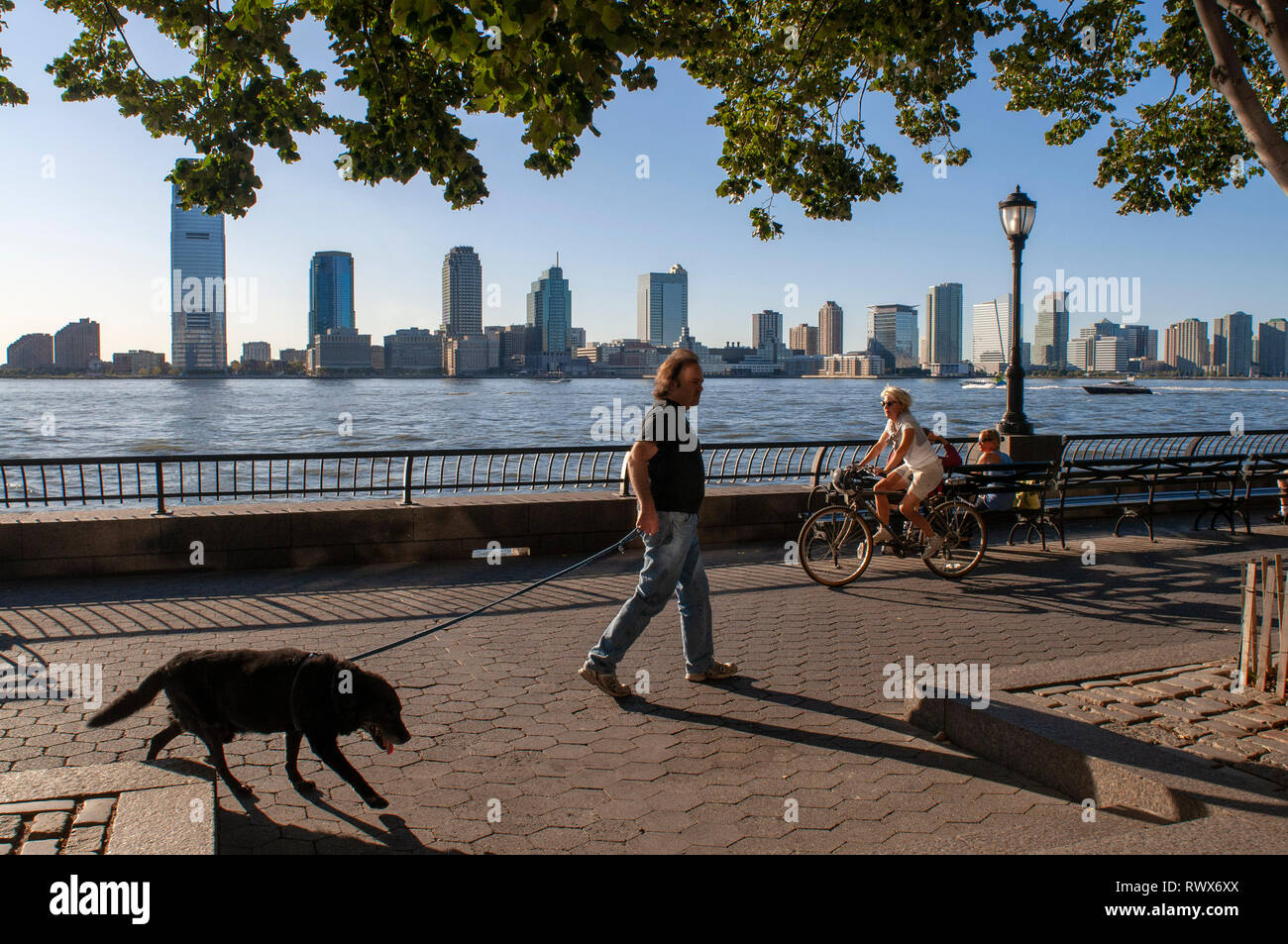 Battery Park is a park of 10 hectares, located on the southern tip of New York City in Lower Manhattan, overlooking the harbor great for cycling. The  Stock Photo