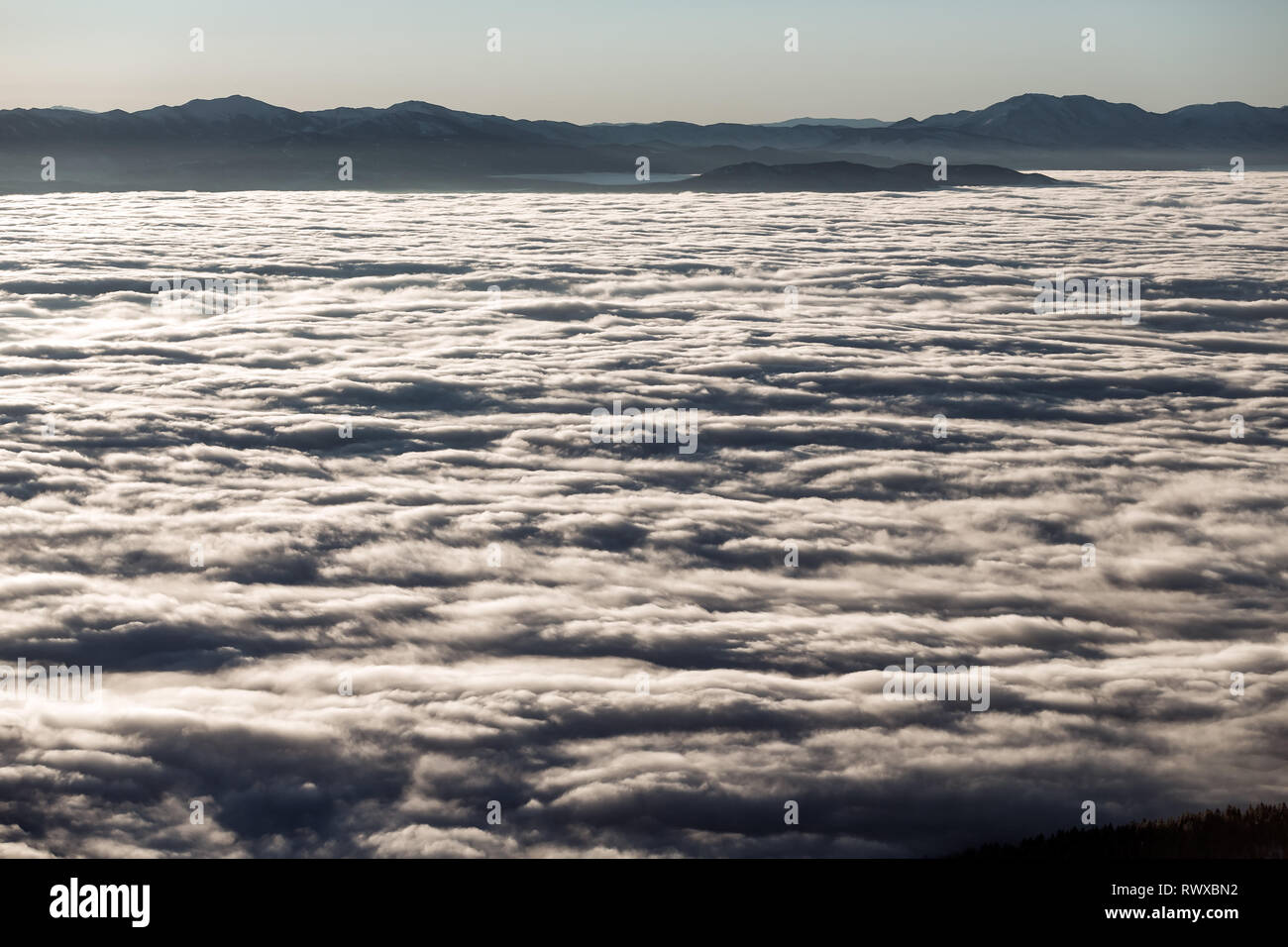 Foggy inversion over Washoe valley in the winter at sunrise Stock Photo