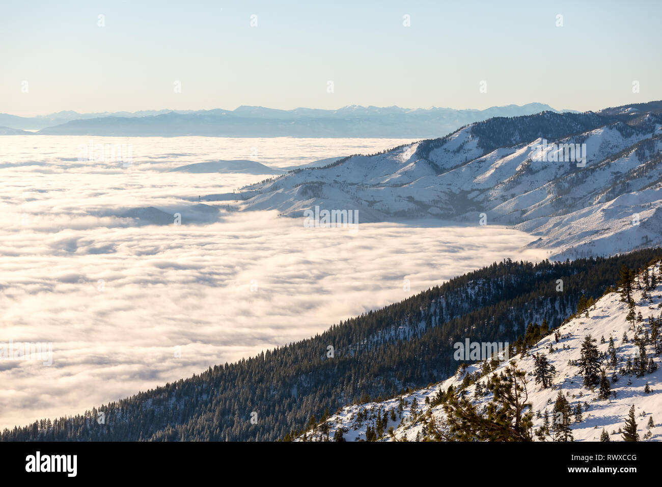 Foggy inversion over Washoe valley in the winter at sunrise Stock Photo