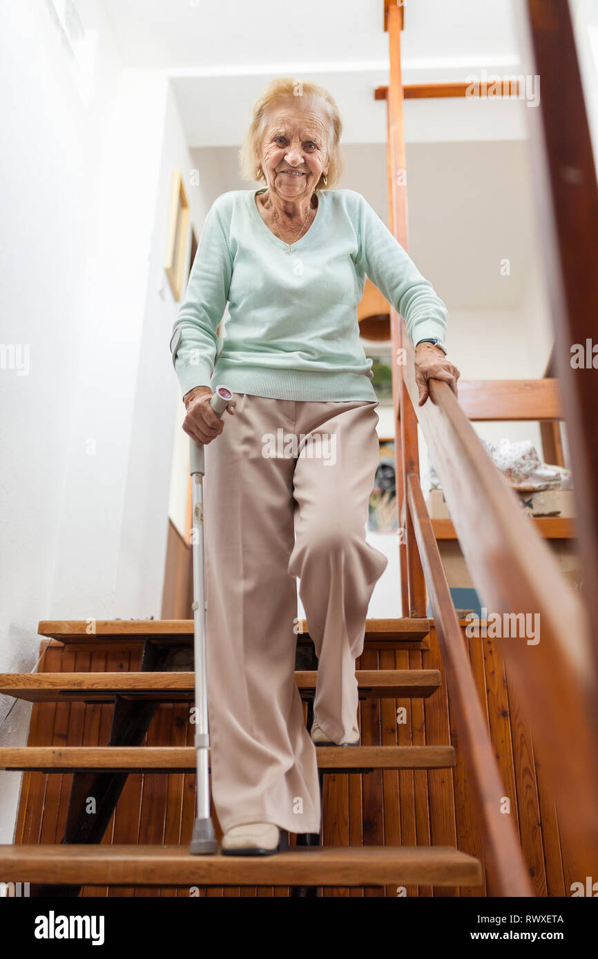 walking stairs cane woman using stick down steps alamy elderly