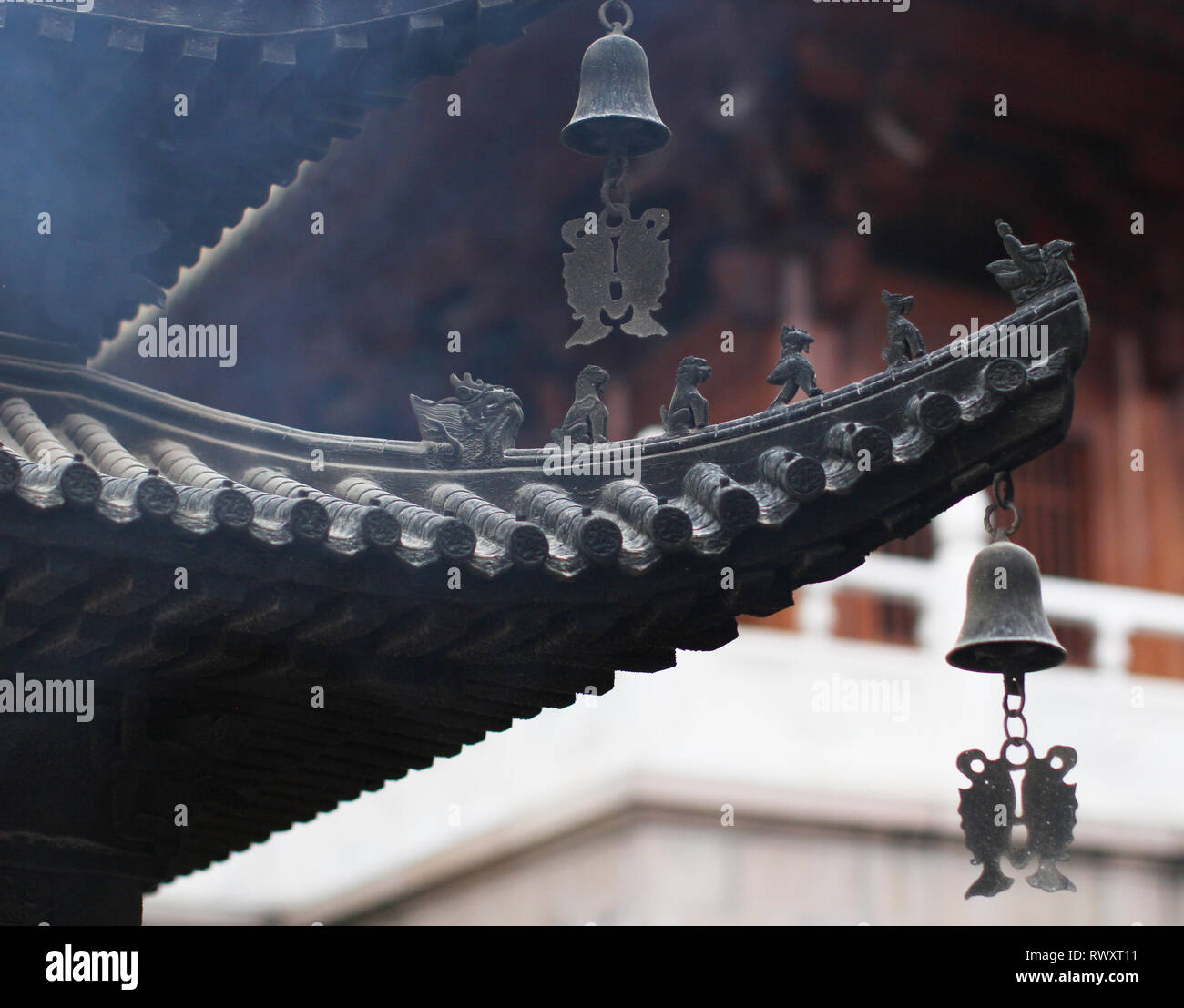 Typical chinese roof decorations (Buddhist temple in Shanghai) Stock Photo