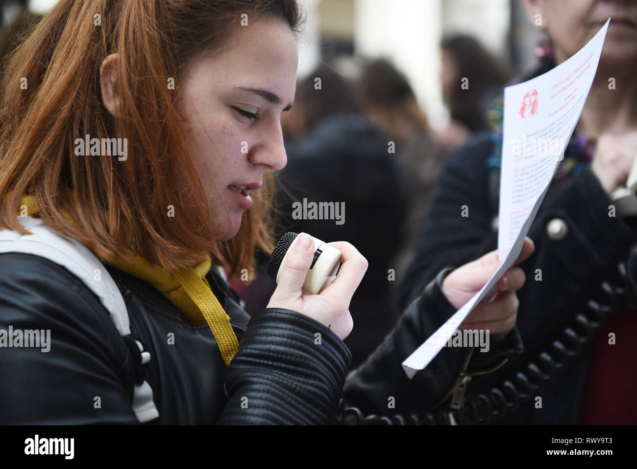 Thessaloniki, Greece. 8th Mar, 2019. A woman chants slogans during a protest. Due to International Women's Day women of the Hellenic Women Federation demonstrated at the center of the city, demanding equal rights with men in the labor sector and improvement on the working conditions of working mothers. Credit: Giannis Papanikos/ZUMA Wire/Alamy Live News Stock Photo