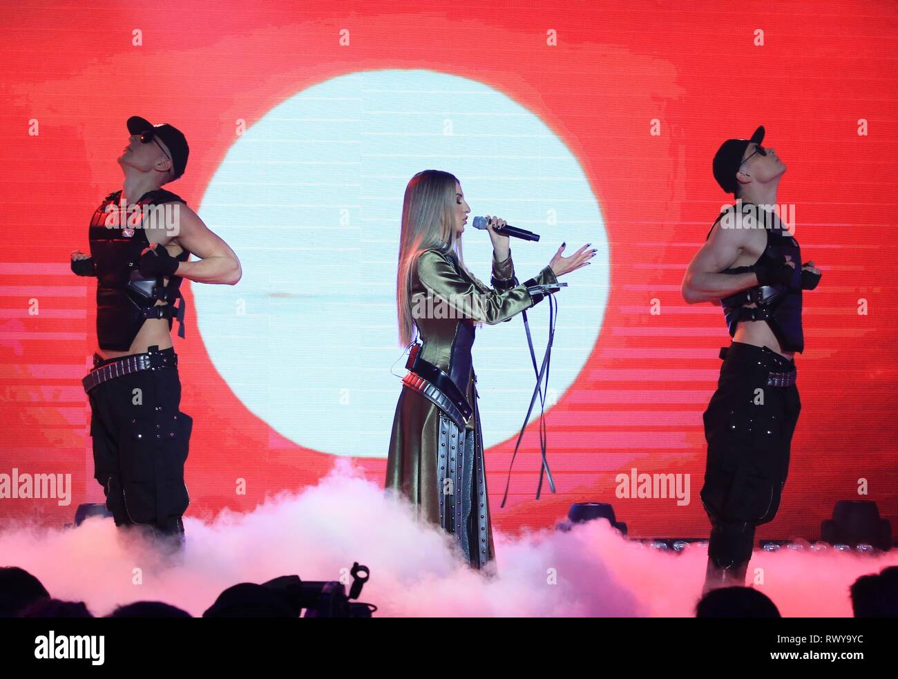 Minsk, Belarus. 7th Mar, 2019. A singer (C) performs during a selection contest of the Eurovision Song Contest 2019 in Minsk, Belarus, March 7, 2019. Winners of the event will participate in the Eurovision Song Contest 2019 which will be held on May 14-18. Credit: Efim Mazurevich/Xinhua/Alamy Live News Stock Photo