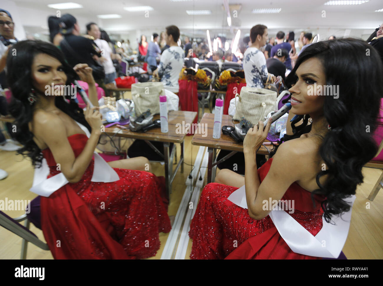Pattaya, Thailand. 8th Mar, 2019. A beauty contestant from Peru, Adriana Jya seen preparing backstage before the final of the annual Miss International Queen 2019 transvestite contest in the beach resort town of Pattaya, Thailand. Credit: Chaiwat Subprasom/SOPA Images/ZUMA Wire/Alamy Live News Stock Photo