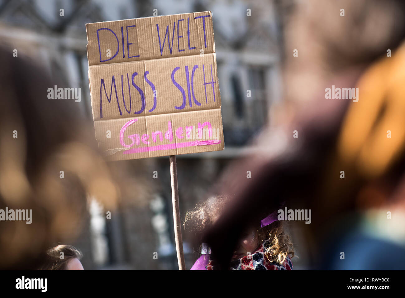 Hamburg, Germany. 08th Mar, 2019. People take part in a demonstration on International Women's Day at the town hall market. Parties, unions, and women's rights organizations have called for a rally for more equality in front of the Hamburg City Hall on World Women's Day. At the same time, the 'Hamburg Alliance for the International March 8 Strike' called on all 'women, lesbians, non-binary, trans and inter persons' to lay down their work. Credit: Christian Charisius/dpa/Alamy Live News Stock Photo