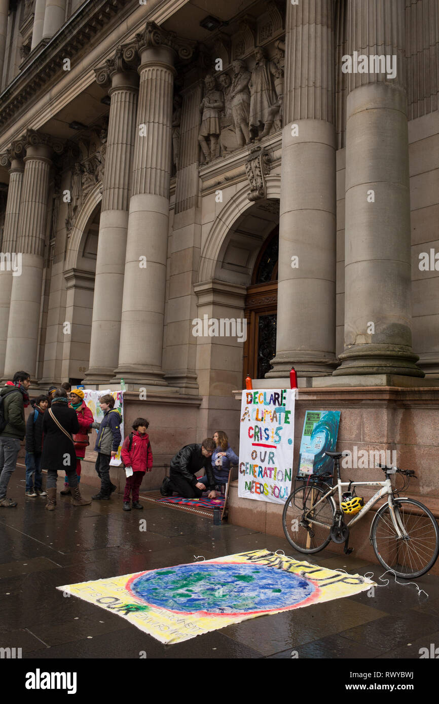 Glasgow, Scotland, UK. 8 March 2019. Activists and supporters of Extinction Rebellion climate group hold a picnic outside the Glasgow City Chambers demanding that the city council declare a climate emergency and create a ‘Scottish Citizens’ Assembly’ to oversee the changes to climate change policy. The activists vow to hold the picnic protests on a daily basis until climate action is taken by the city council. Credit: Jeremy Sutton-Hibbert/Alamy Live News. Stock Photo