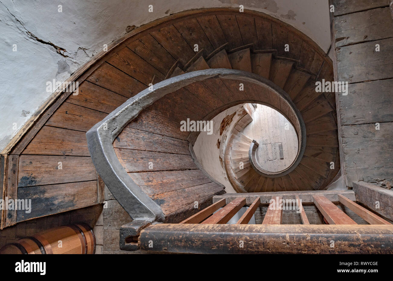 Early spiral staircase leading from Upnor castle building down to the gun platform which helped protect the English fleet in the Medway from attack Stock Photo