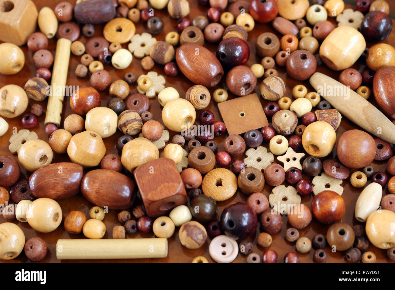 Mixed loose wooden beads for making jewellery Stock Photo Alamy