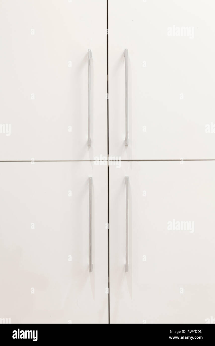 White chest with drawers and silver handles Stock Photo Alamy