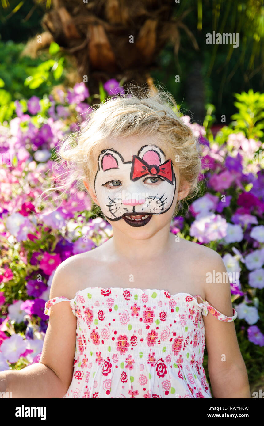 blond girl with cat face painting Stock Photo Alamy