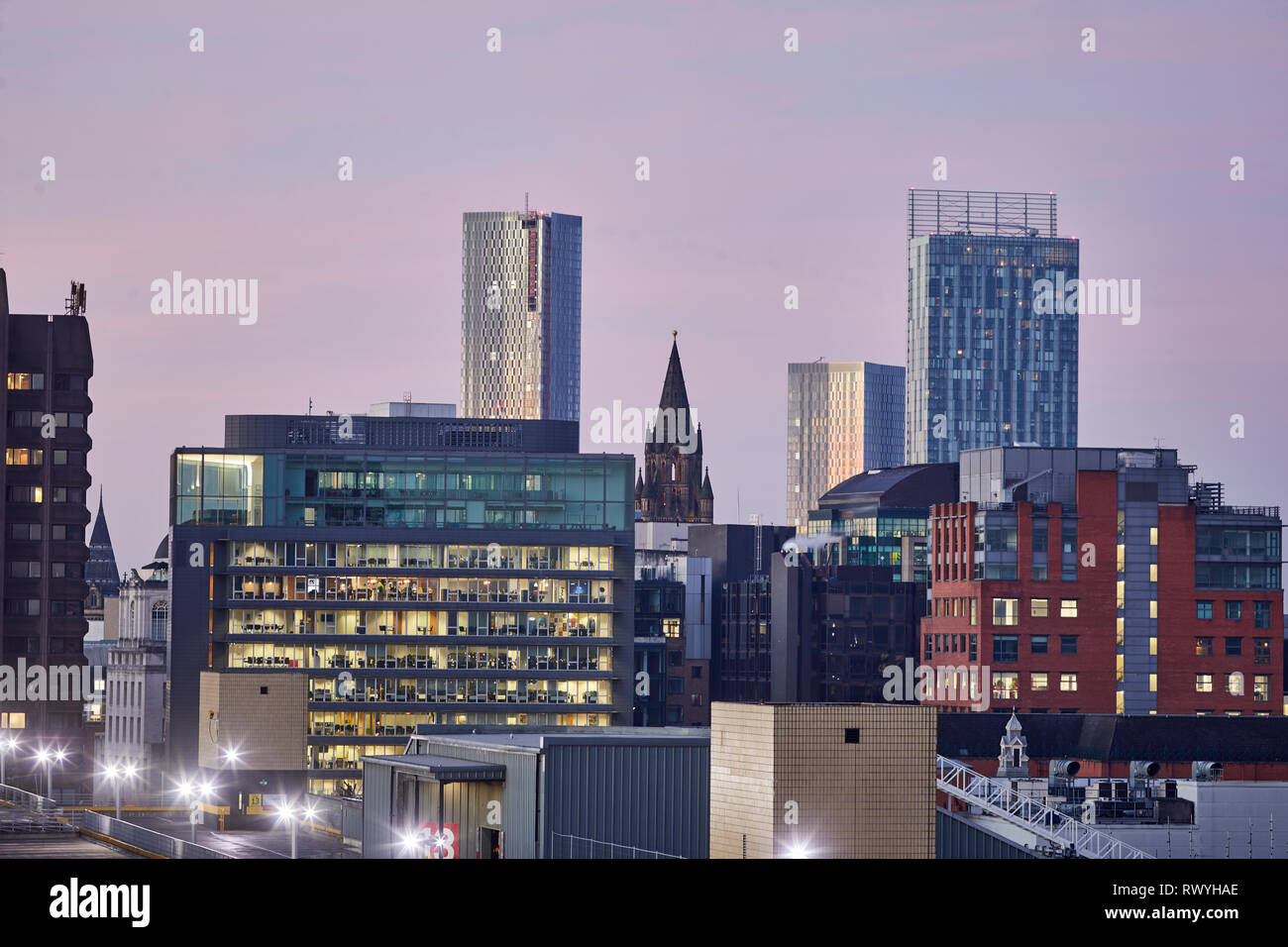 Dawn first light Manchester skyline from above looking to the Town hall and Deansgate Square Stock Photo