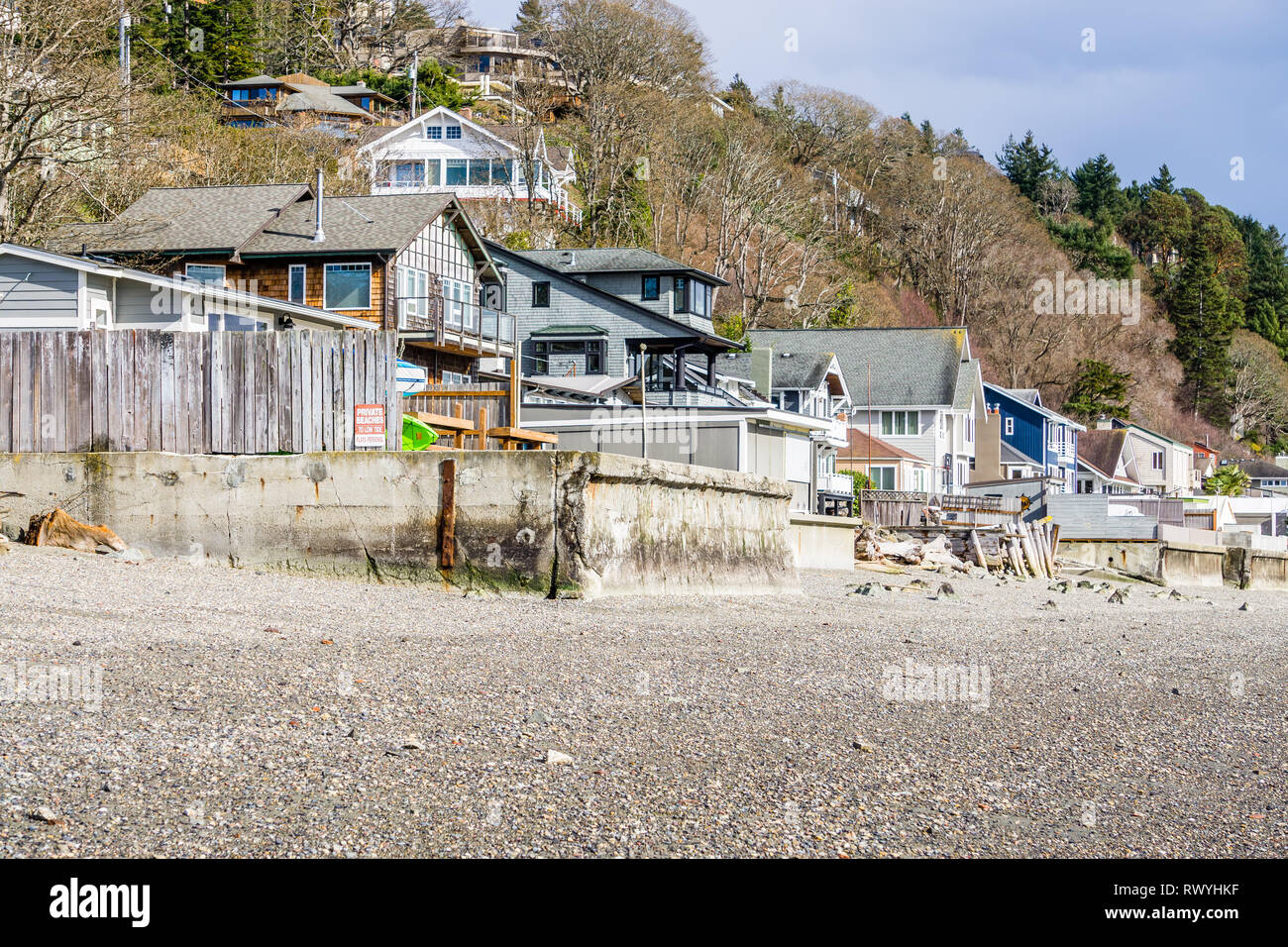 Waterfront homes face the Puget Sound in Burien, Washington. The tide