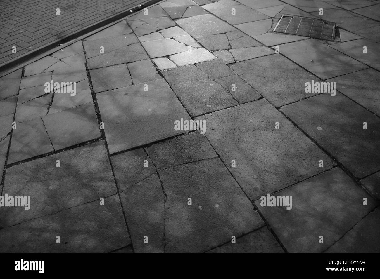 Black and white photo of a pavement in London. Stock Photo