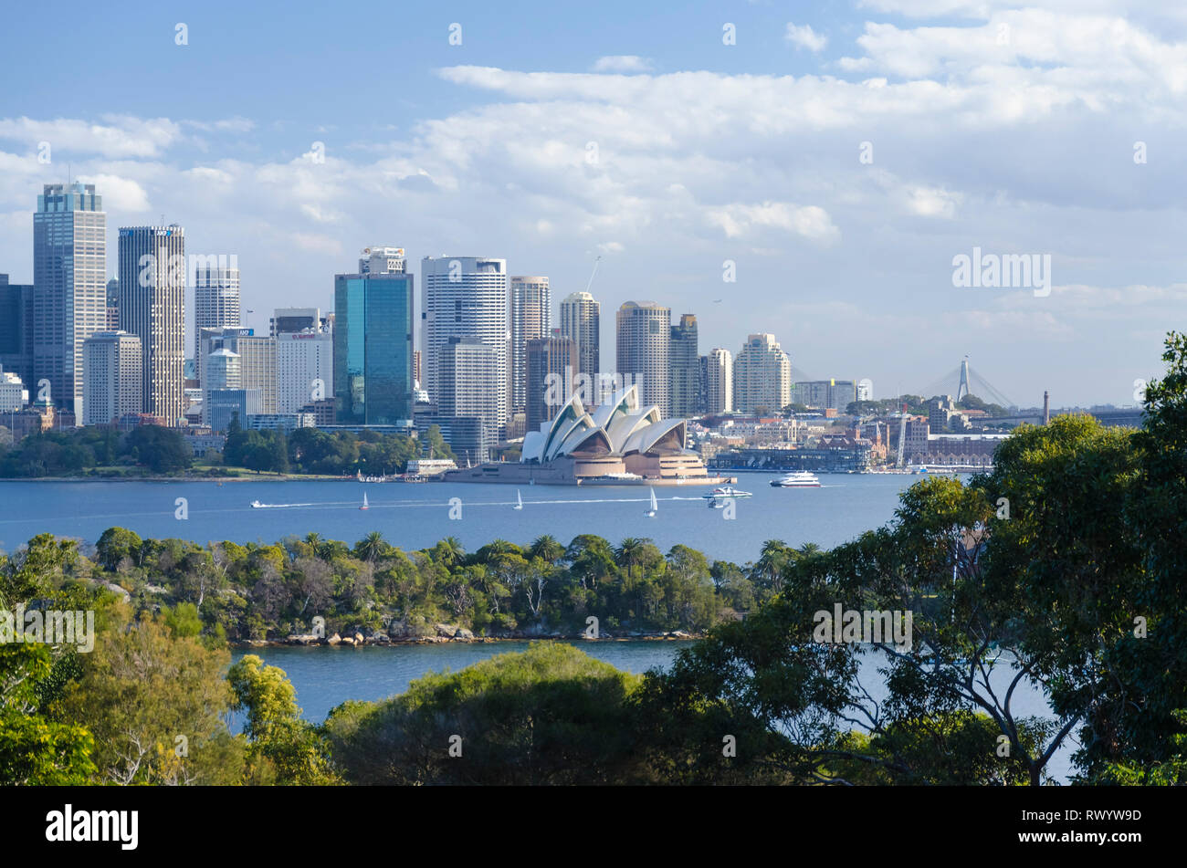The famous opera house in front of the skyline of Sydney. Stock Photo