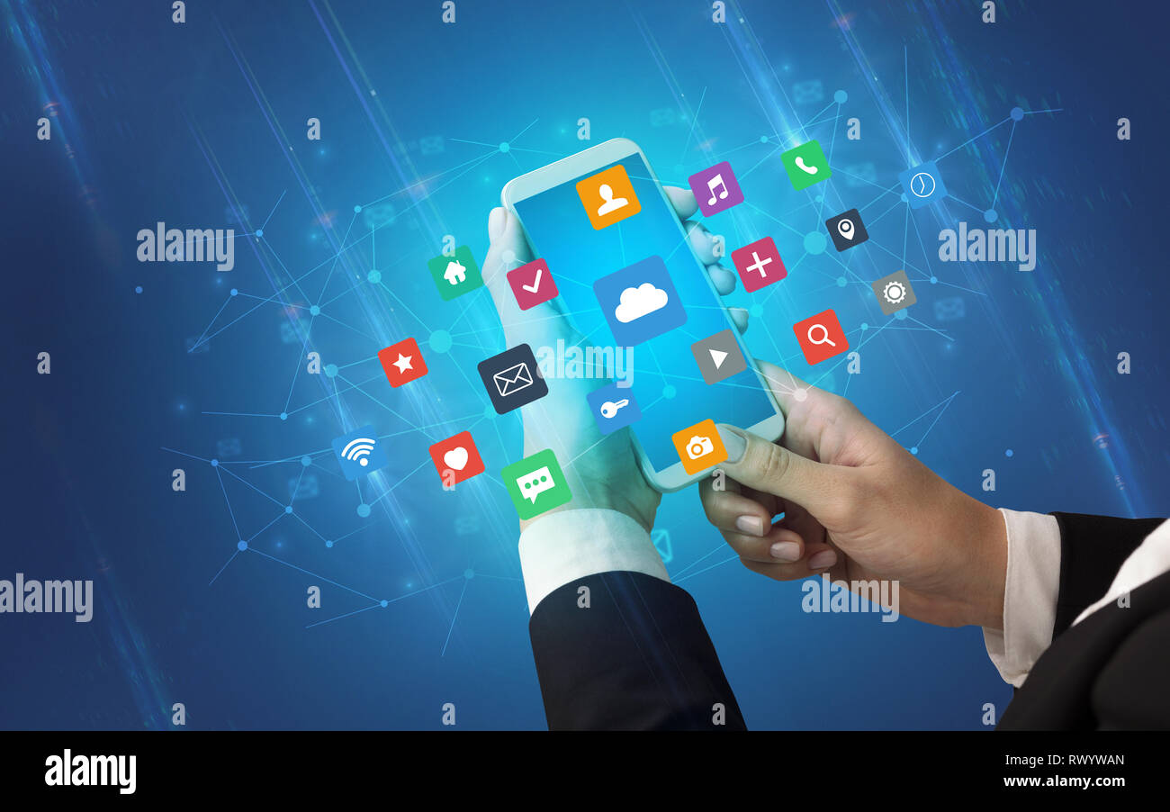 Female hand using smartphone with colorful application icons around ...