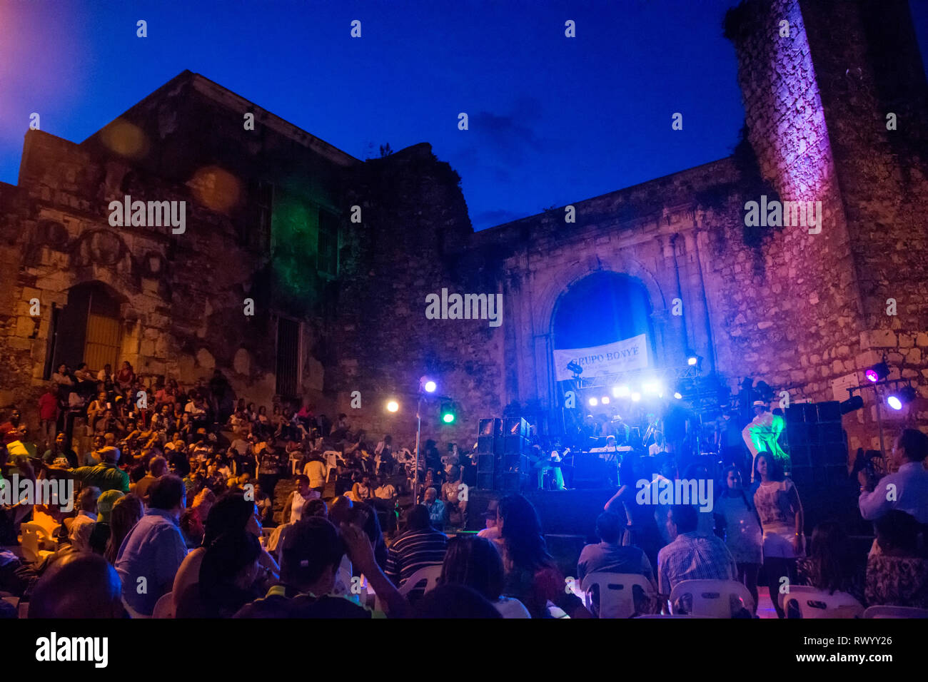 The open-air concert of Grupo Bonyé in La Zona Colonial, in front of the ruins of San Francisco, originally a Franciscan monastery built at the beginn Stock Photo
