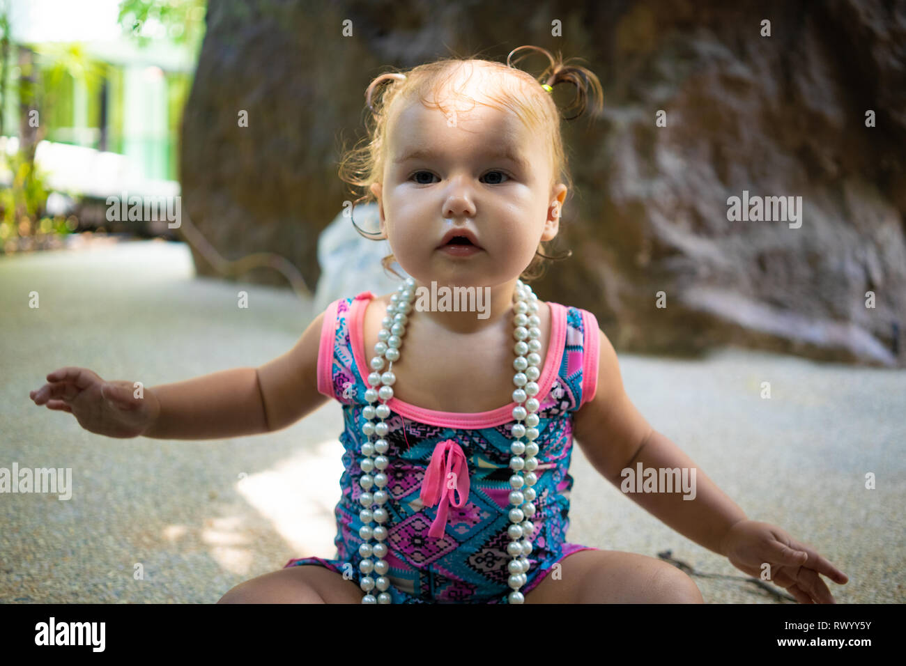 Asian girl in white bathing suit words Asian girl in white bathing suit