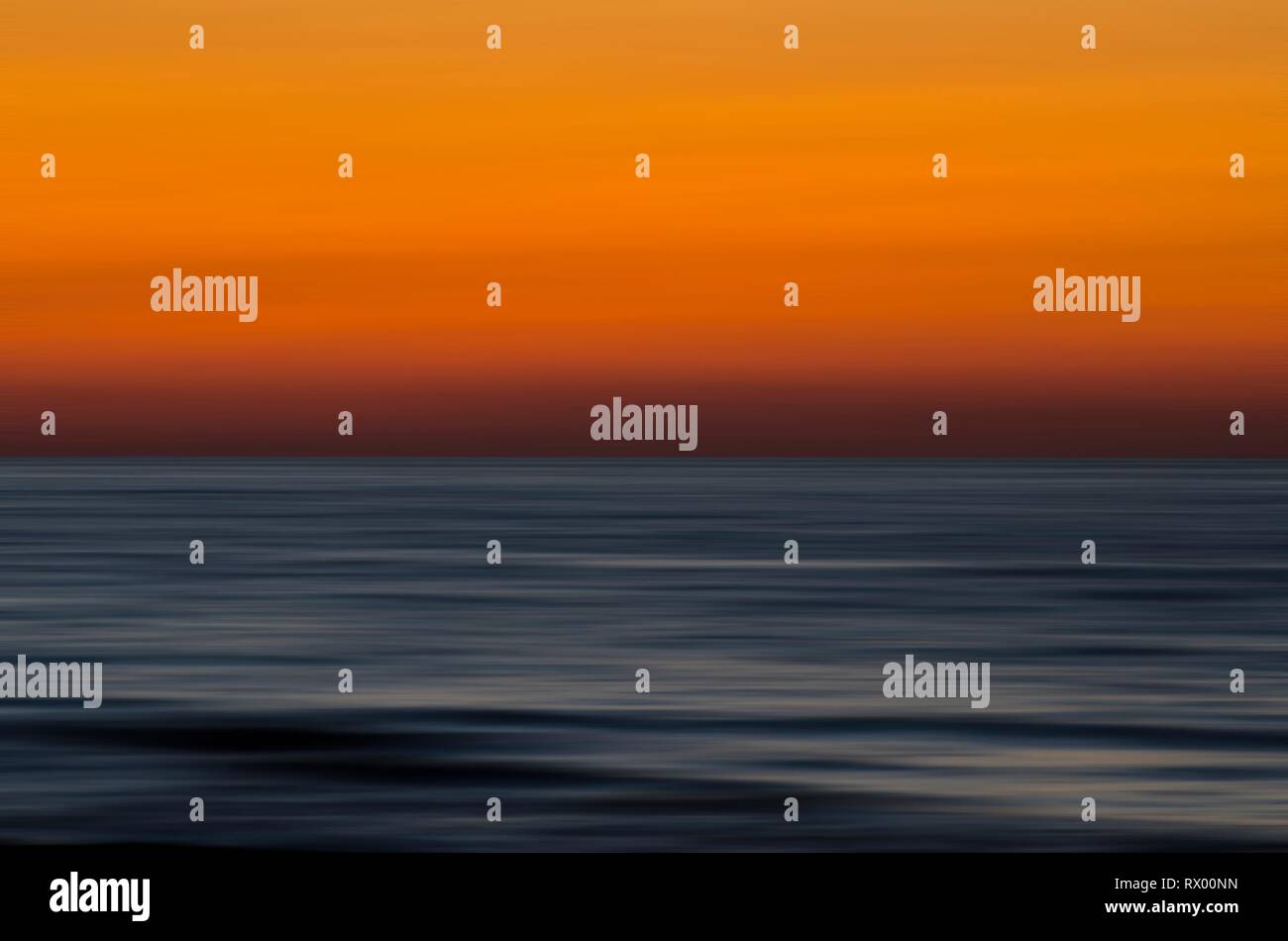 Beautiful sea scenery with sunset sky Stock Photo - Alamy